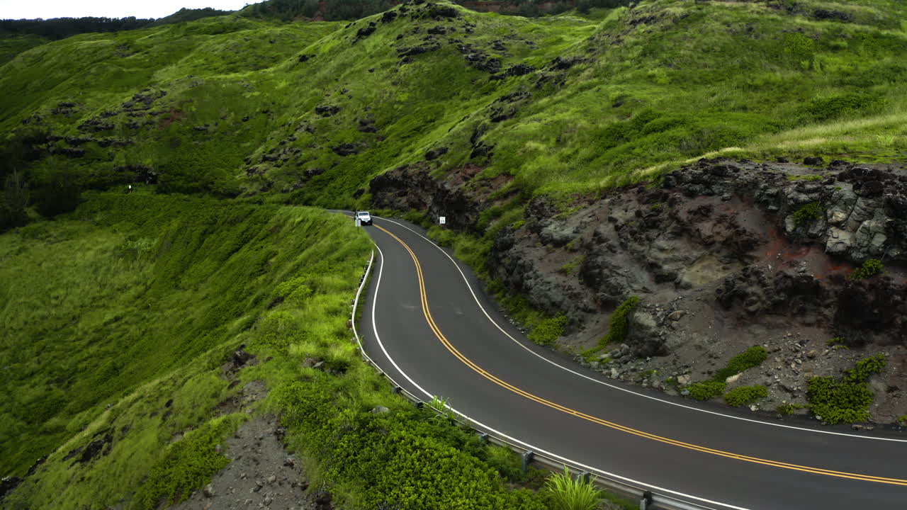 Aerial View Of Jeep Climbing Mountains In Maui, Hawaii.