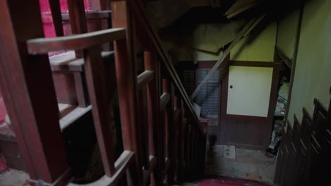 spooky staircase in ruined haunted mansion in japan