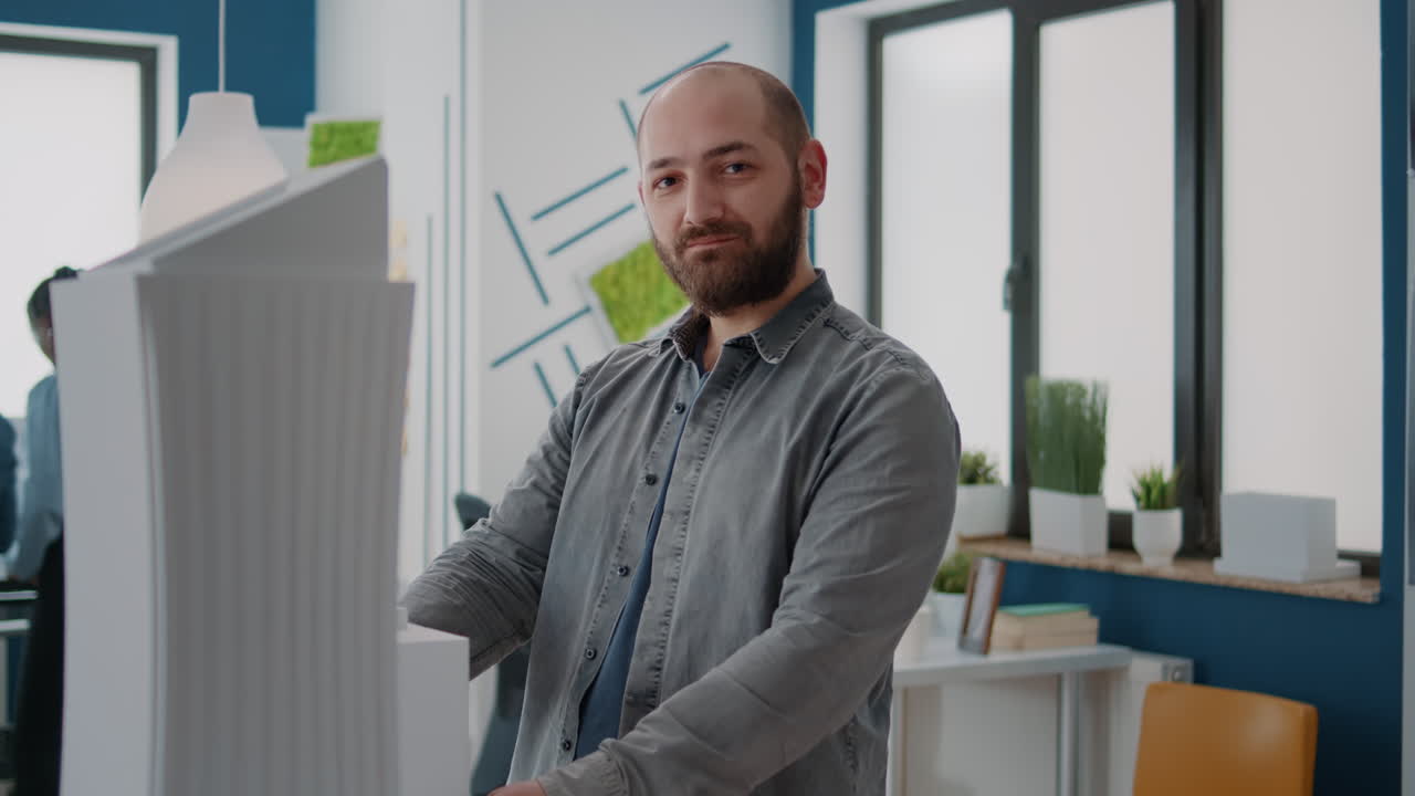 People working with building model