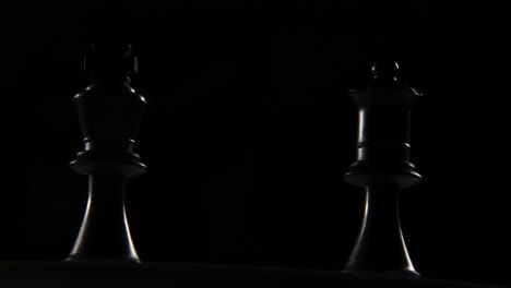 Cinematic-shot-of-a-black-queen-and-king-chess-piece