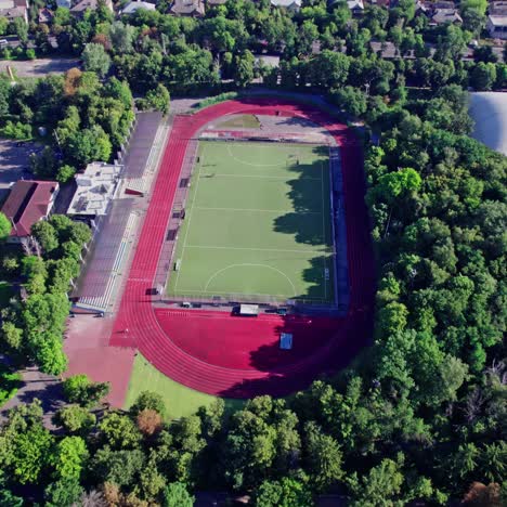 aerial view of a stadium and track with people