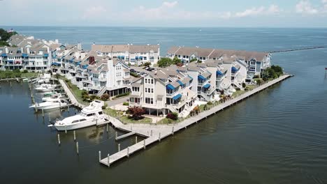 upscale condos and boat marina in fishing creek, chesapeake beach bay, maryland usa, drone aerial view