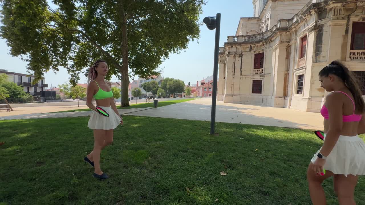 Women playing outside in park
