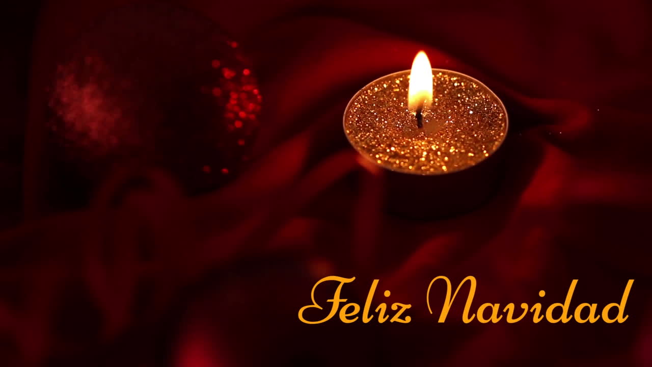 animación de feliz navidad texto sobre vela
