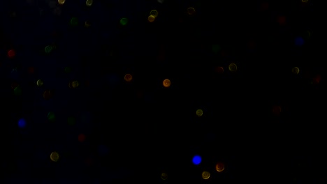 fondo abstracto con bokeh brillante y brillante. las partículas de bokeh de colores brillantes premian las chispas de polvo.