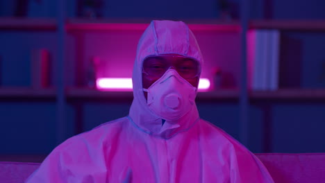 person in protective gear giving a thumbs up