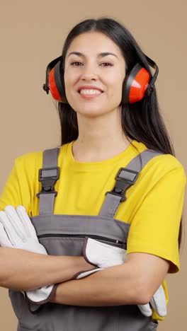 professional woman in work uniform with safety gear
