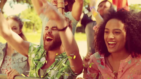animazione di confetti che cadono su persone che ballano e applaudono durante un concerto musicale