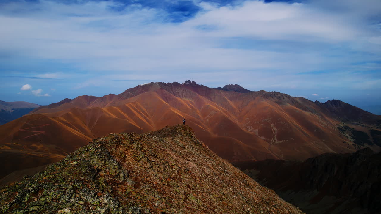 Autumn Mountain Peak with Hikers