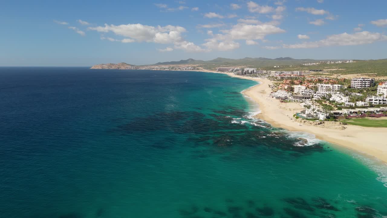 Drone view flying over the rocks of the Pacific Ocean in Cabo San Lucas Mexico near San José del Cabo.
