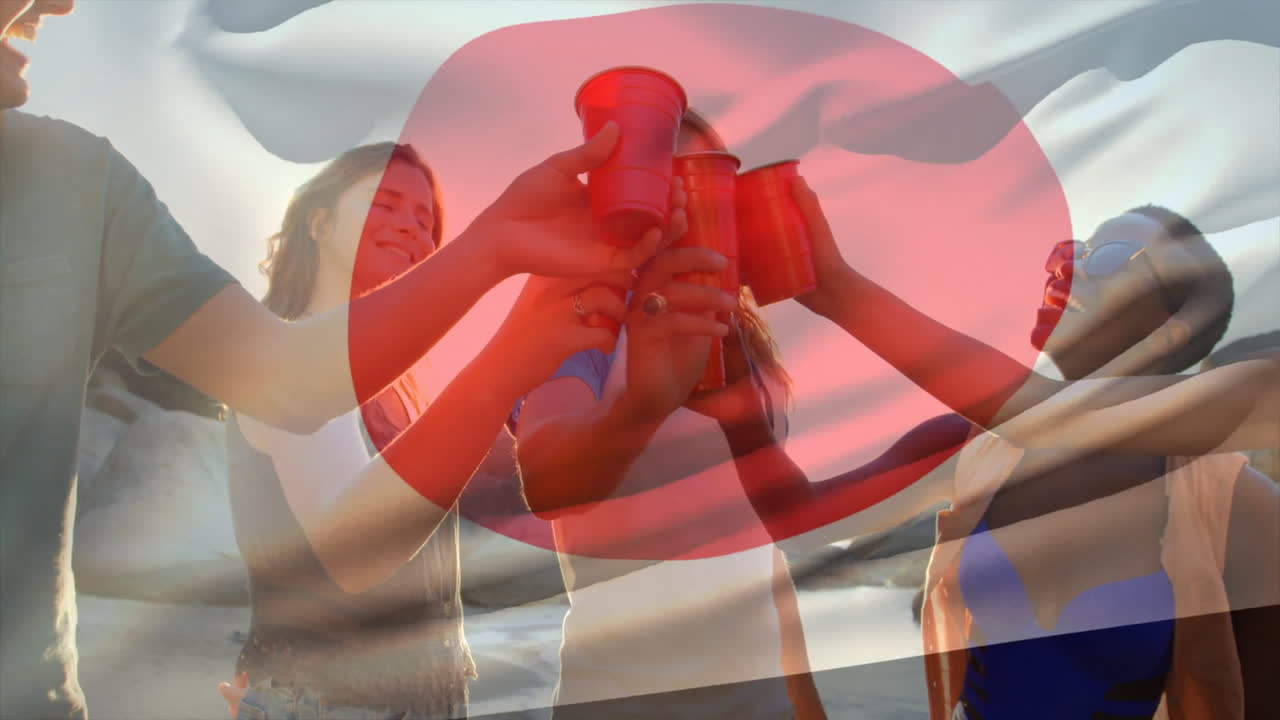 Friends toasting with red cups on beach over abstract red shape animation