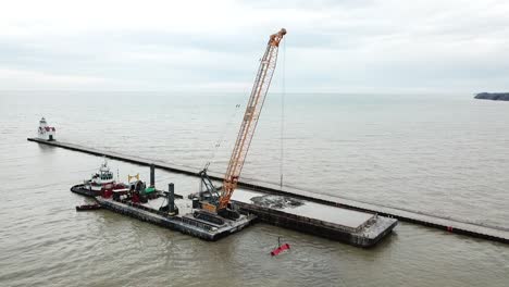 Dredging-operation-in-Kewaunee-Harbor-on-Lake-Michigan,-Kewaunee,-Wisconsin-4