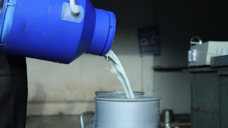 farmer makes quality test of freshly milked milk to be sent to the dairy industry