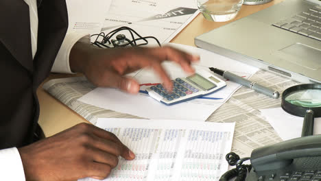 ethnic businessman reviewing his personal account