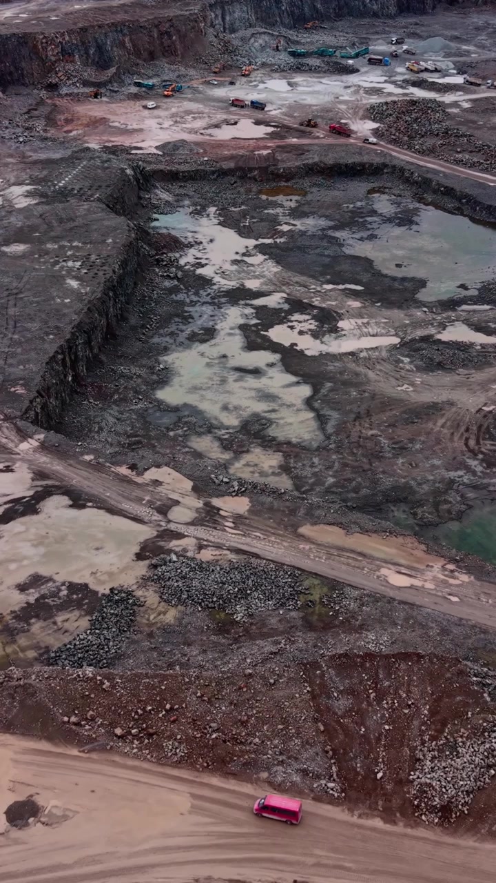 Aerial View of a Large Industrial Stone Quarry with Heavy Machinery