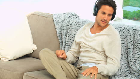 handsome man listening to music