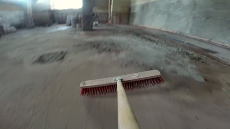 sweeping building site with broom gopro