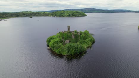 aerial view of mcdermott's castle with panorama of lough key