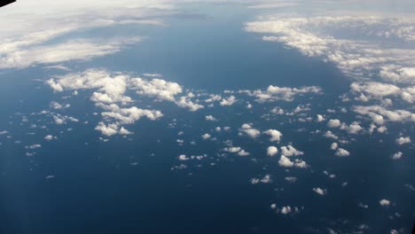 Aerial,-view-of-planet-earth-from-spaceship-or-airplane-window