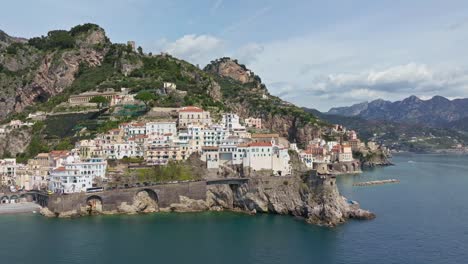 Coastal-Italian-village-on-cliffside,-Amalfi-coast,-sunny-day,-aerial-view