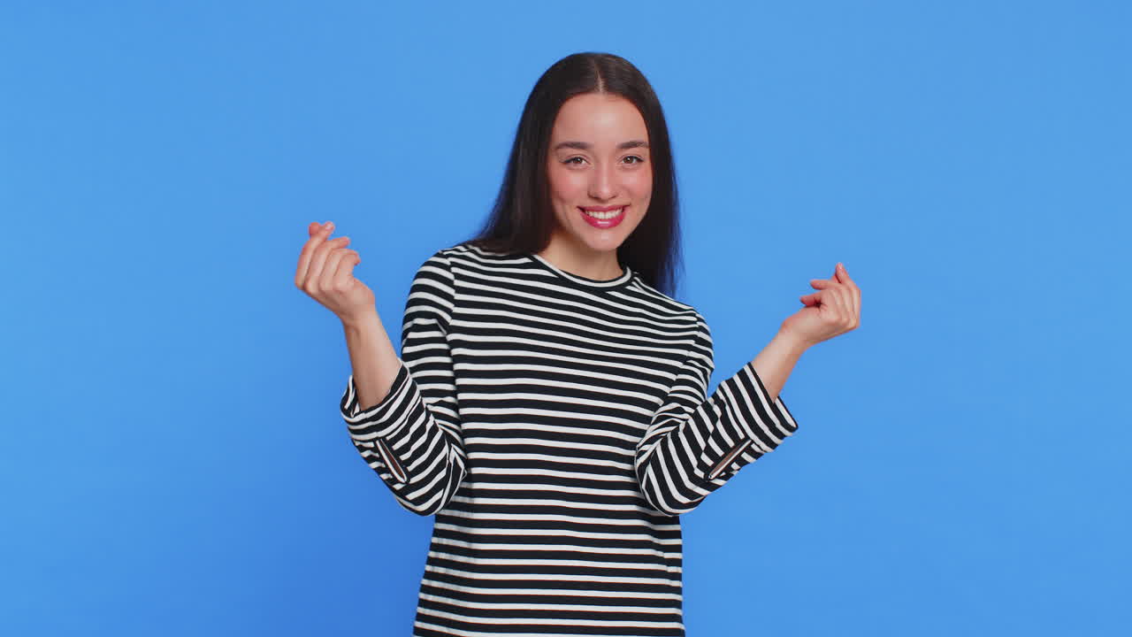 Woman showing wasting throwing sharing money more tips big profit winning lottery jackpot shopping