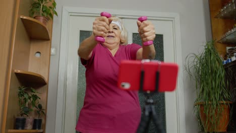 Retired-senior-woman-doing-workout,-training,-fitness,-sport-activity-exercises-during-coronavirus