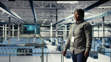 portrait of smiling data center manager working to improve ai rigs