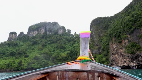 scenic boat ride through lush, rocky landscapes