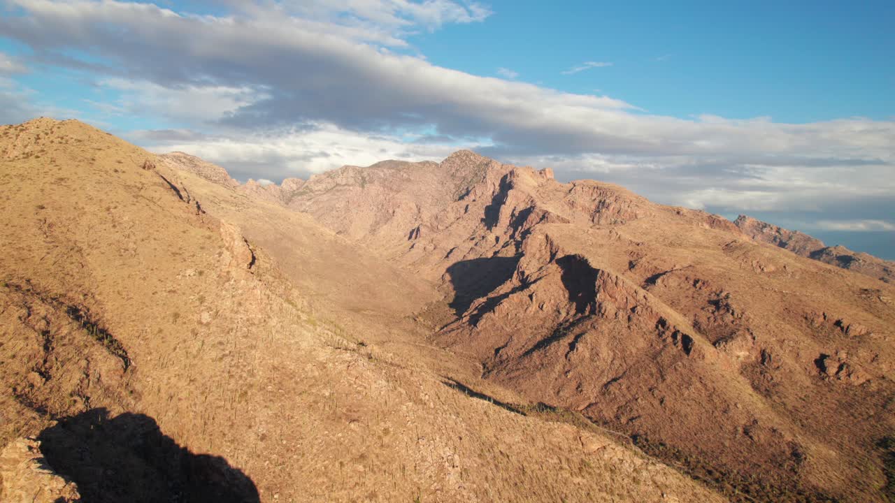 Long peaceful aerial of mountains in the Arizona desert, 4K drone shot.