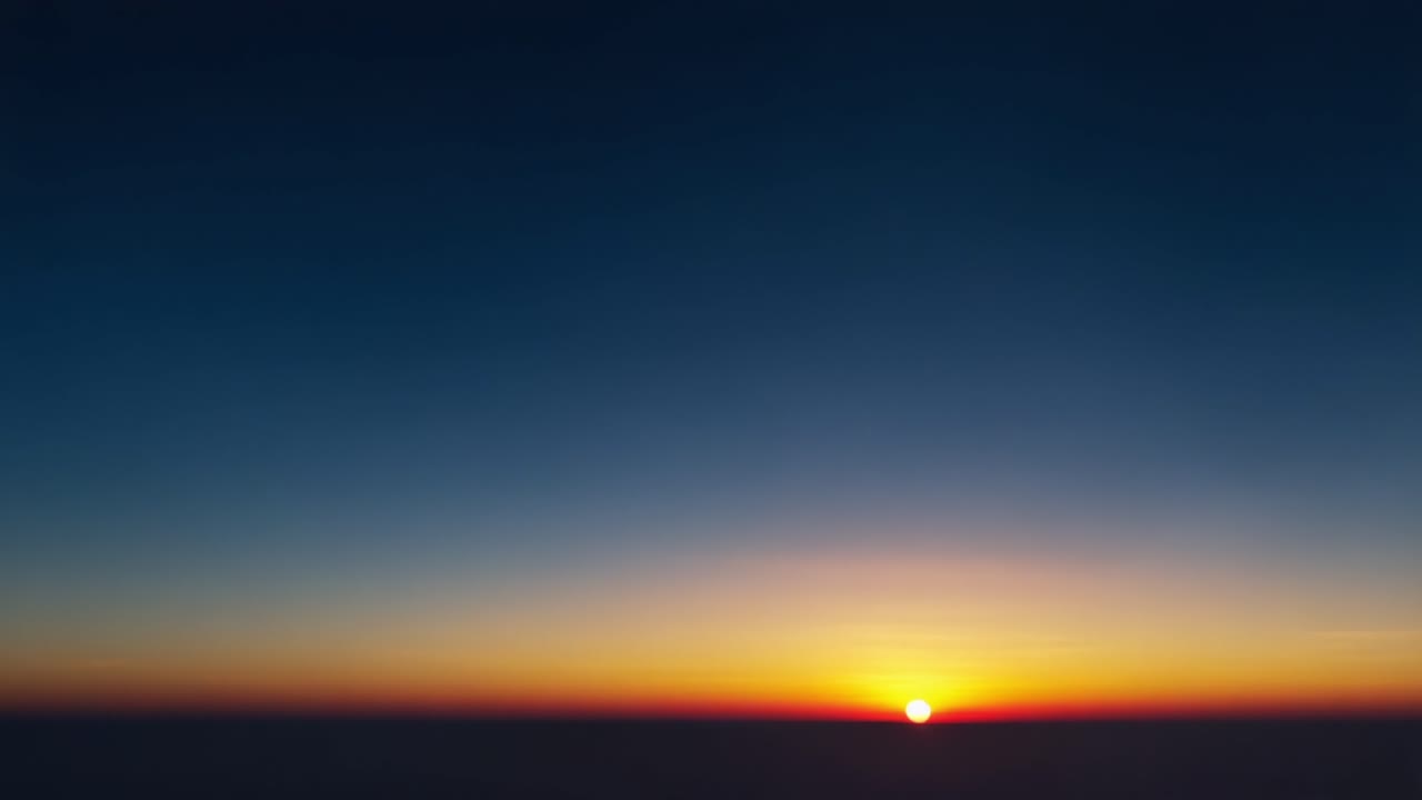 A Beautiful Gradient of Colors as the Sun Rises and Sets Above the Horizon, Capturing the Tranquility of Nature at Dawn and Dusk