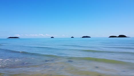 AERIAL:-The-clear-relaxing-coastal-waters-of-the-beautiful-Koh-Chang-Island,-Thailand,-Asia