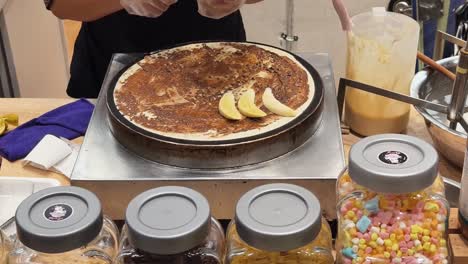 making crepes with bananas and chocolate