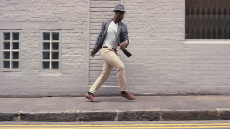 contemporary funky african american man street dancer dancing freestyle in the city