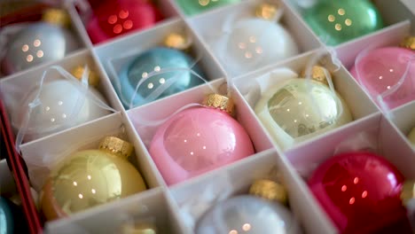 Narrow-focus-on-colorful-Christmas-tree-balls-arranged-in-a-box