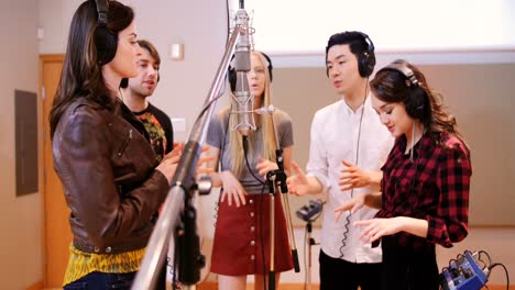 singers performing in studio