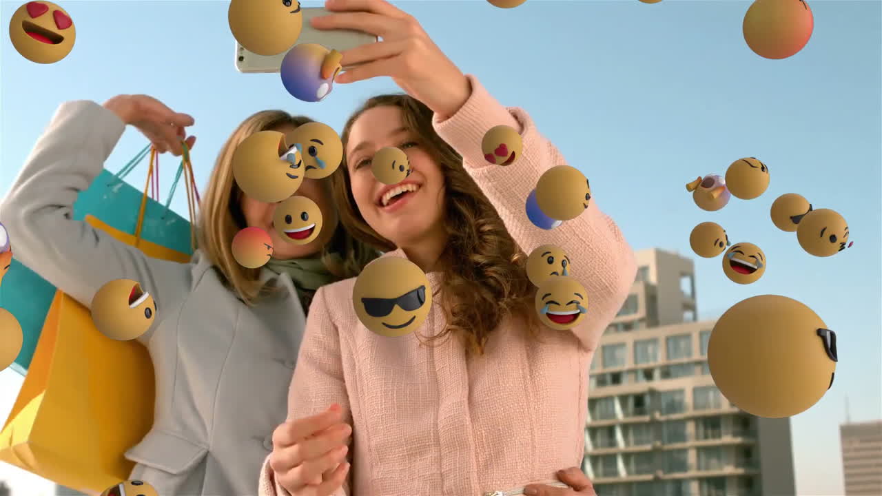 iconos de emoji con amigos tomando una selfie en el fondo