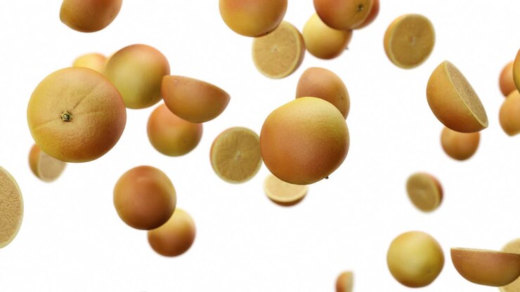 Slowly falling oranges on an white background