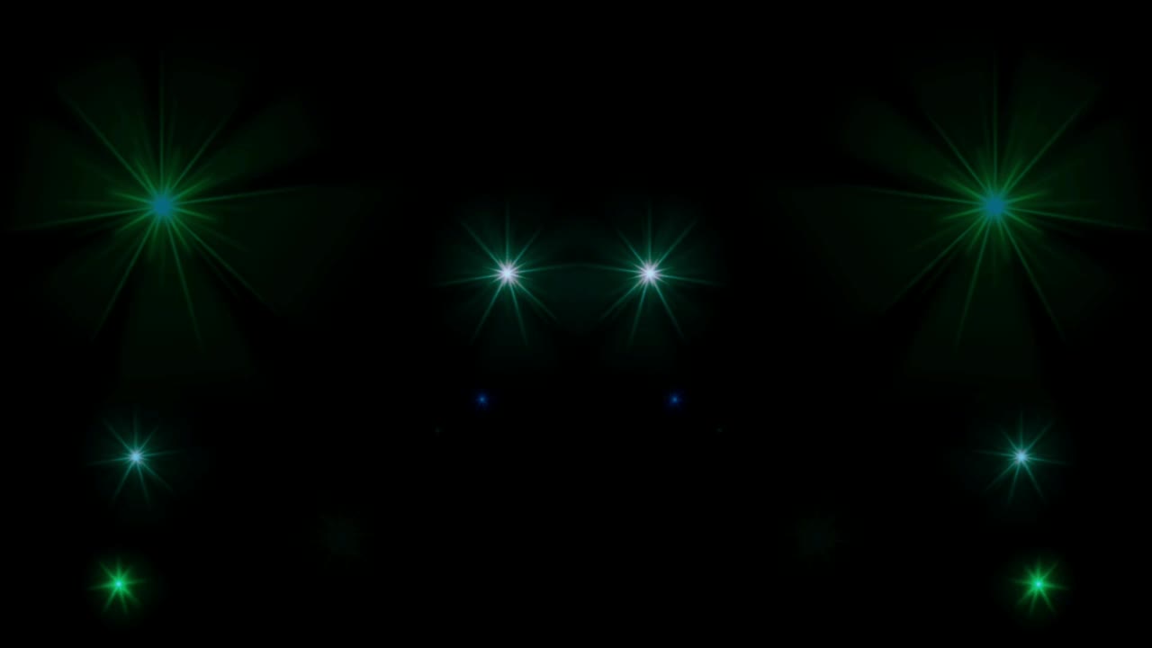 la luz verde de la animación brilla sobre un fondo negro.