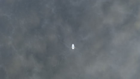 small rowing boat filmed from high above