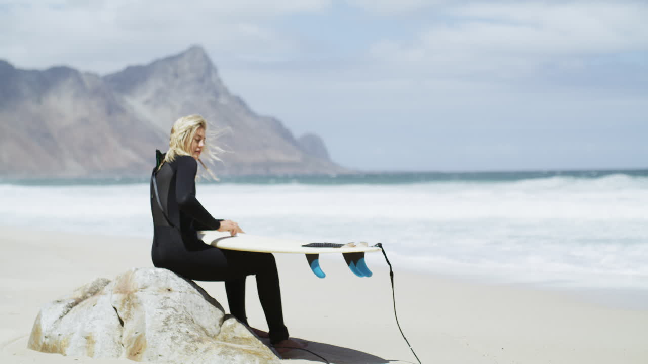 Wax gives her more grip on her board