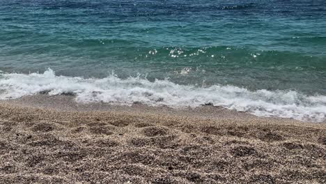 aegean sea with light waves in athens during the summer