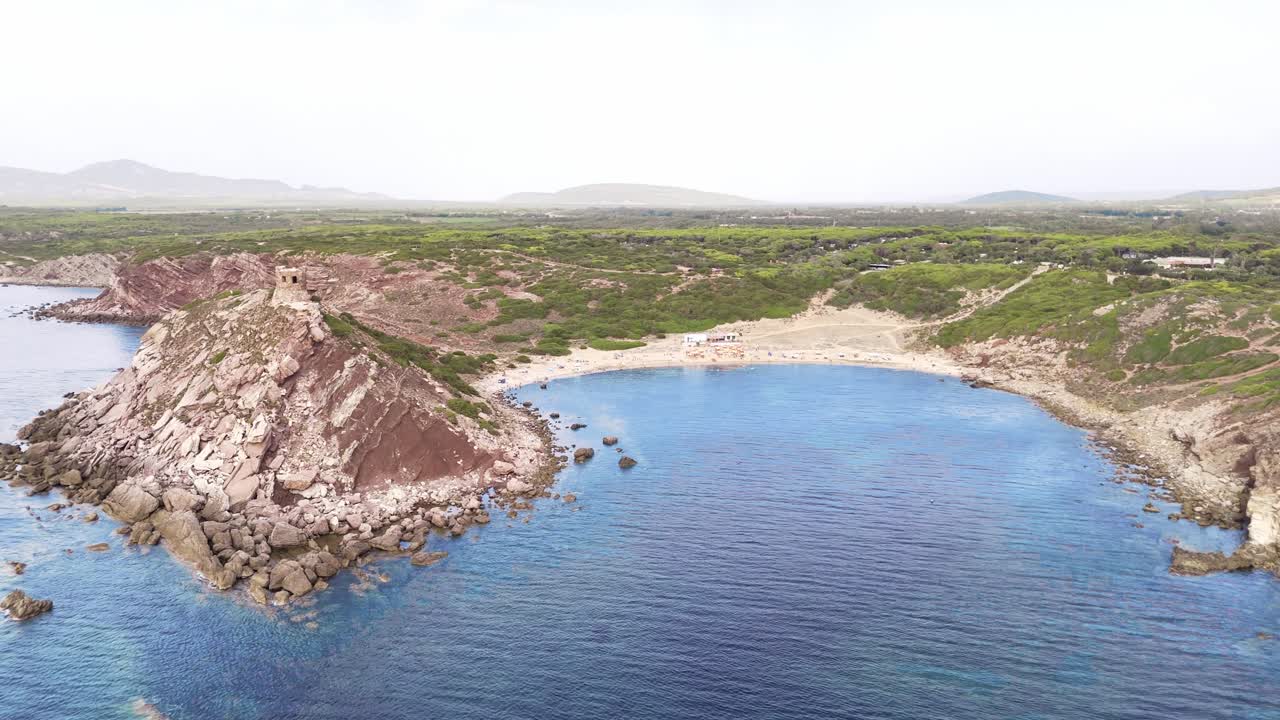 Aerial View of a Secluded Beach with a Tower