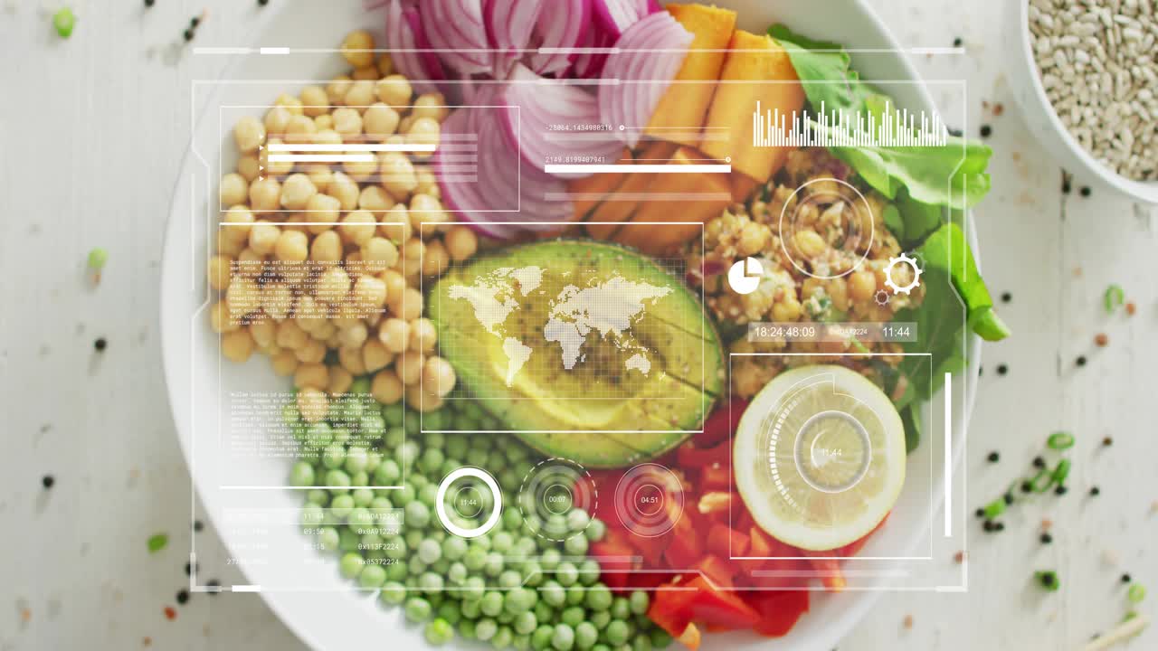 As hi-tech graphics overlaying scene, data overlays animating over salad bowl for nutrient analysis