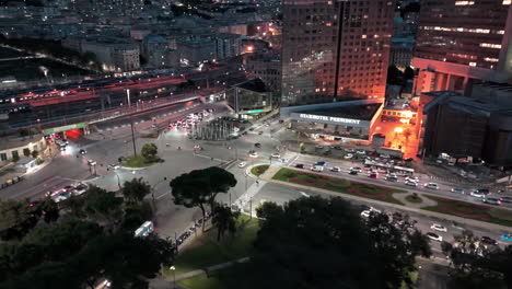 night aerial view of traffic flow on via brigate partigiane in genoa, itlay