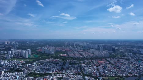 ho chi minh city drone panorama of district seven on sunny day with blue sky and moving clouds