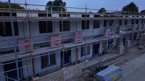 aerial panning footage of new homes being built, hendrik-ido-ambacht