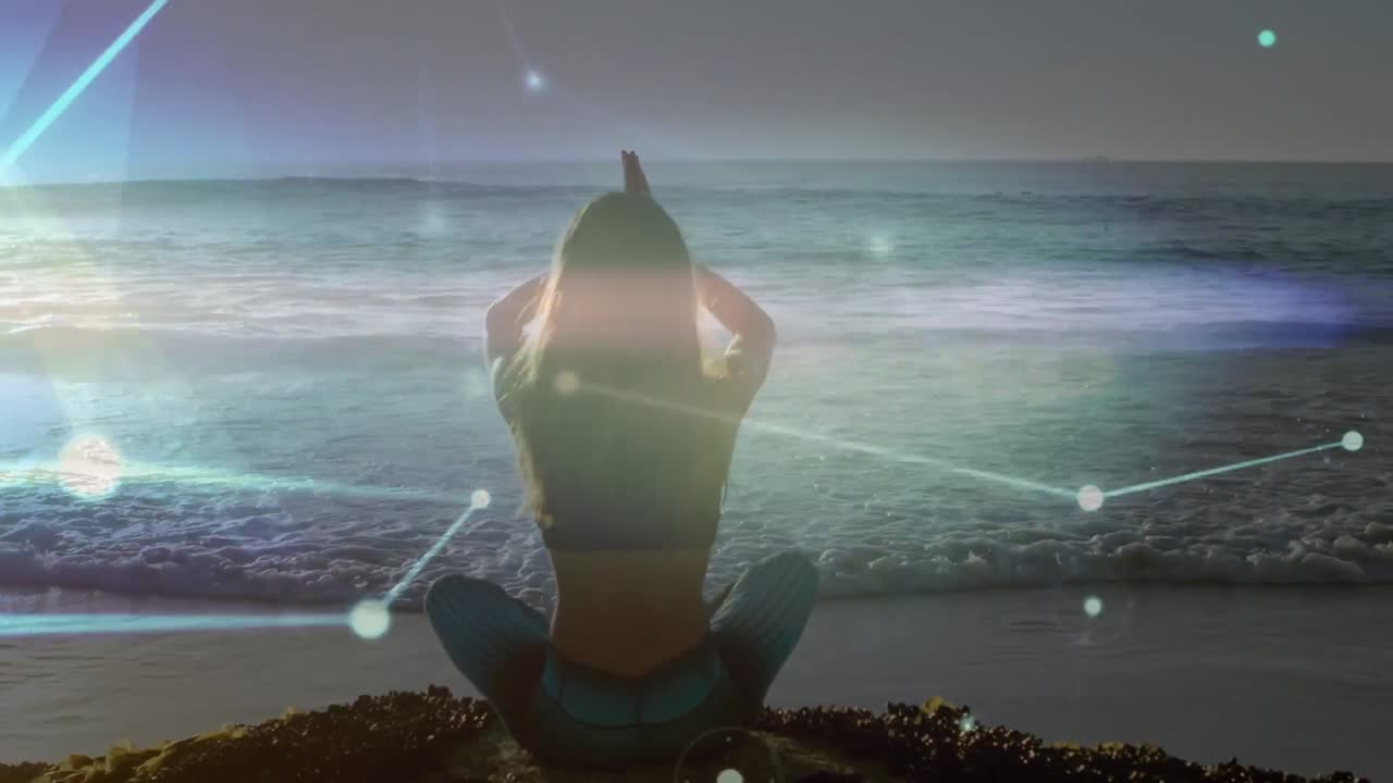 해변에서 요가를 연습하는 백인 여성에 대한 연결 네트워크의 활성화