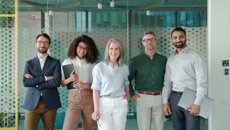 happy diverse business people team standing in office, group portrait.