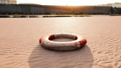 old life preserver in dry riverbed