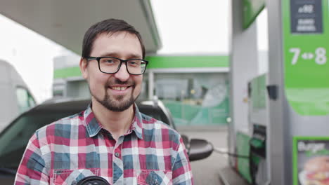 man at a gas station